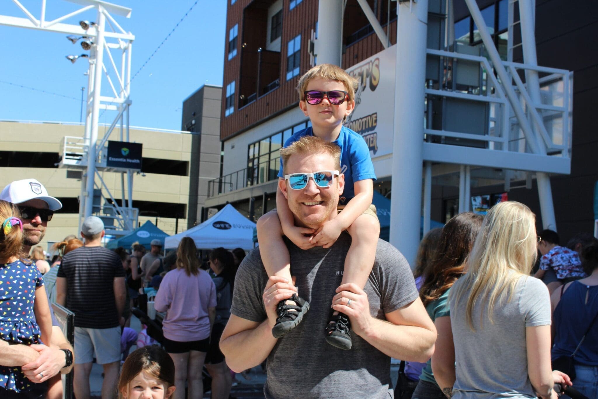 Parent and child enjoying a West Fargo community event