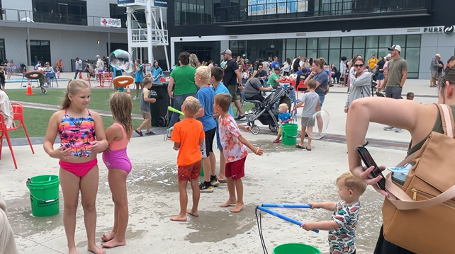 Families and community members of all ages participating in a West Fargo Events outdoor event